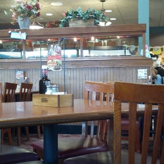 Photo taken at Sizzler by Chris Q. on 3/23/2013