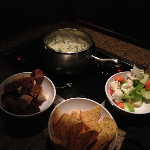 Photo taken at The Melting Pot by Mauricio P. on 2/14/2013