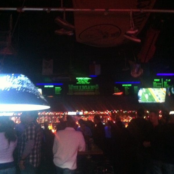 Photo taken at Mulligan&#39;s Shot Bar by Jesse C. on 12/8/2013