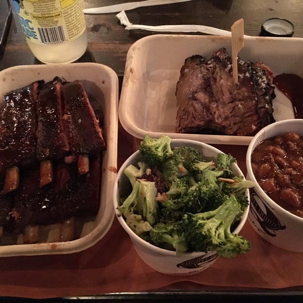 Photo taken at Mighty Quinn&#39;s BBQ by Carlos R. on 9/3/2019