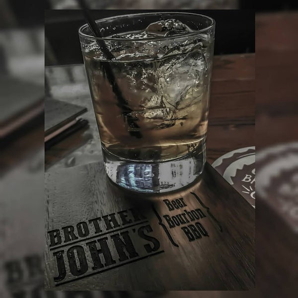 Photo taken at Brother John&#39;s Beer, Bourbon &amp; BBQ by Juan C. on 12/27/2015