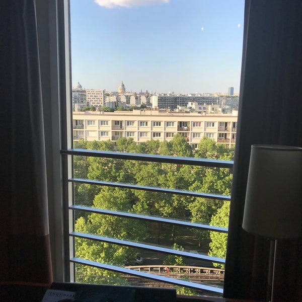 Photo taken at Paris Marriott Rive Gauche Hotel &amp; Conference Center by Atakan Osman Bayman on 5/8/2018