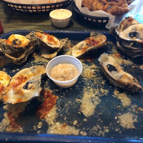 Photo taken at Shuckums Oyster Pub &amp; Grill by B B. on 7/20/2019