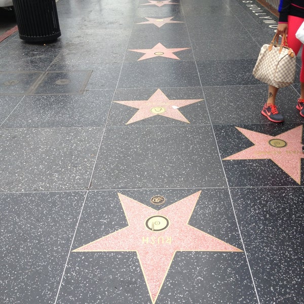 Photo taken at Hollywood Walk of Fame by Alex on 4/14/2013