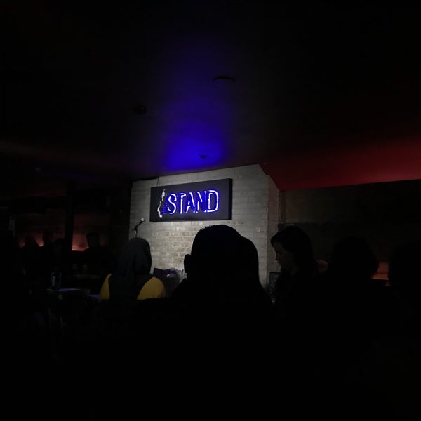 Photo taken at The Stand Restaurant &amp; Comedy Club by Crystal W. on 12/4/2017