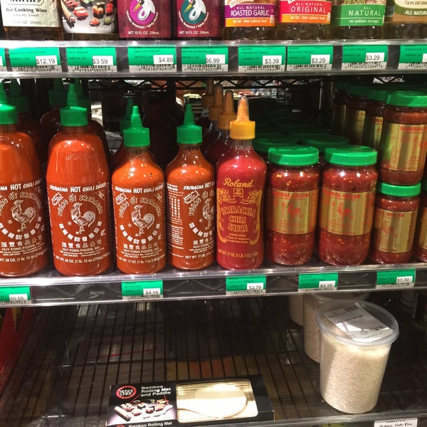 A word to the wise: Huy Fong foods is the original Sriracha, Sambal Oelek, and Chili Garlic Sauce company (one brilliant ex-pat Vietnamese). Note the green tops and the rooster - those are Huy Fong's!