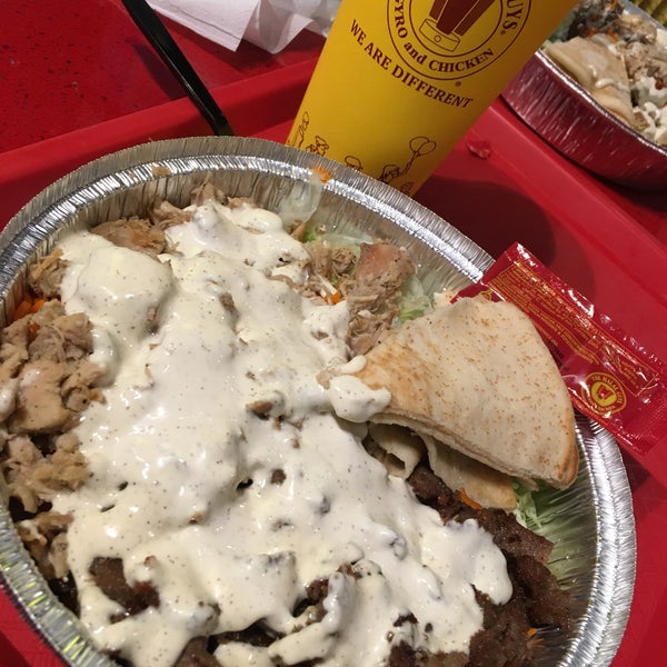 Photo taken at The Halal Guys by Mauricio G. on 9/18/2016