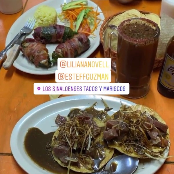 Photo taken at Tacos Y Mariscos Los Sinaloenses by Estefania G. on 7/4/2021