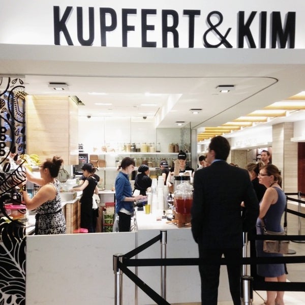 Photo taken at Kupfert &amp; Kim (First Canadian Place) by Luke A. on 6/19/2013