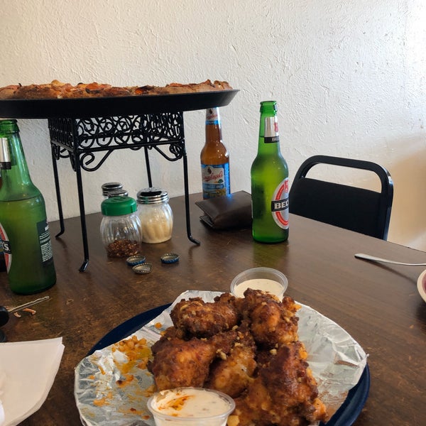 Beer fridge , wings and the pizza is divine , should be ranked #1