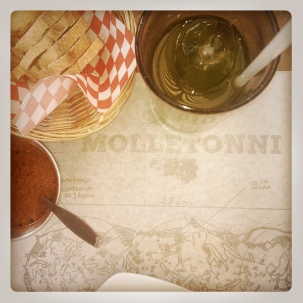 Photo taken at Molletonni Cucina &amp; Bar by Jaime R. on 4/1/2013