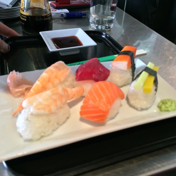 Photo taken at Natural Wok + Sushi Bar by L. D. on 7/7/2014