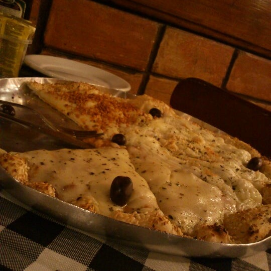 Photo taken at Loppiano Pizza by Marcos Paulo C. on 11/3/2012
