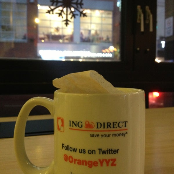 Photo taken at Tangerine Café by Rajeev S. on 12/27/2012