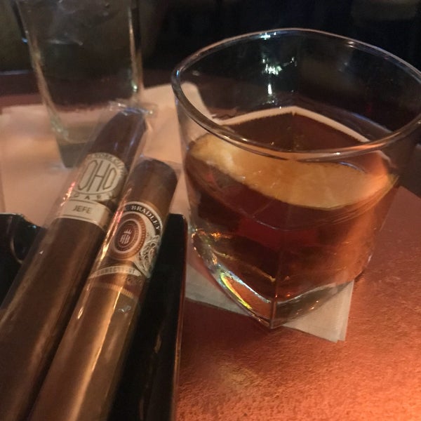 Photo taken at SoHo Cigar Bar by Danny D. on 7/6/2018