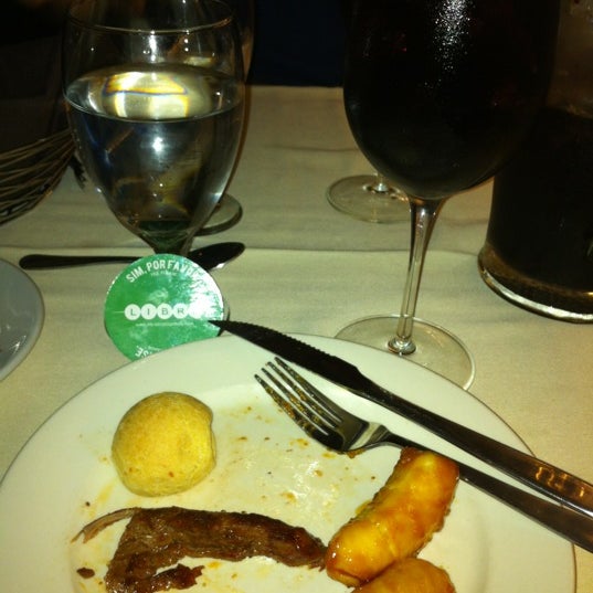 Photo taken at Libra Brazilian Steakhouse by Kiran S. on 12/8/2012
