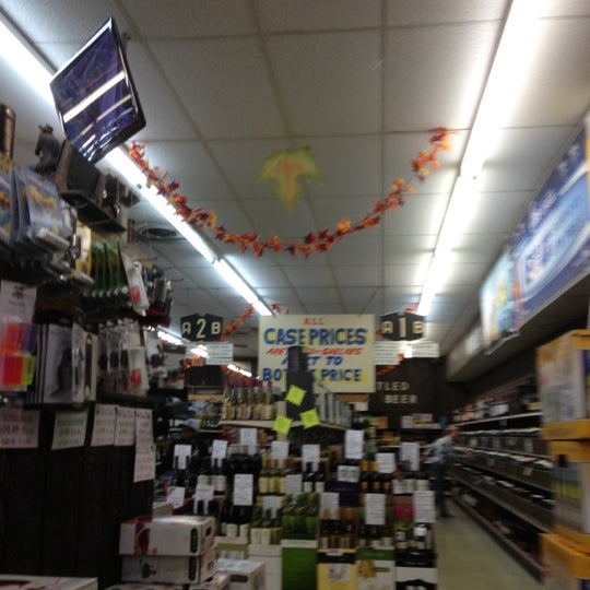 Photo taken at Kenwood Liquors by JL J. on 10/14/2012