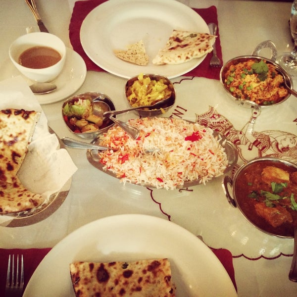 Photo taken at India Quality Restaurant by Jane P. on 5/15/2013