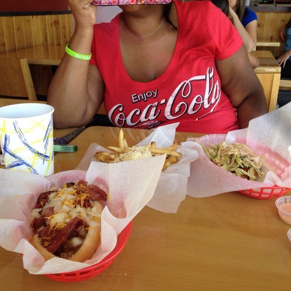 Photo taken at The Slaw Dogs at the Village by Cheron L. on 4/14/2014