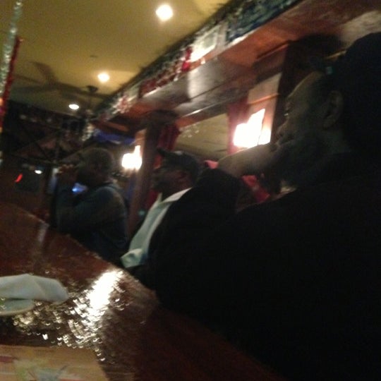 Photo taken at Sangria Tapas Bar &amp; Restaurant by Scott M. on 12/2/2012