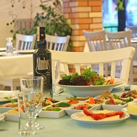 Photo taken at Assos Meze &amp; Balık by Kutlu S. on 10/22/2012