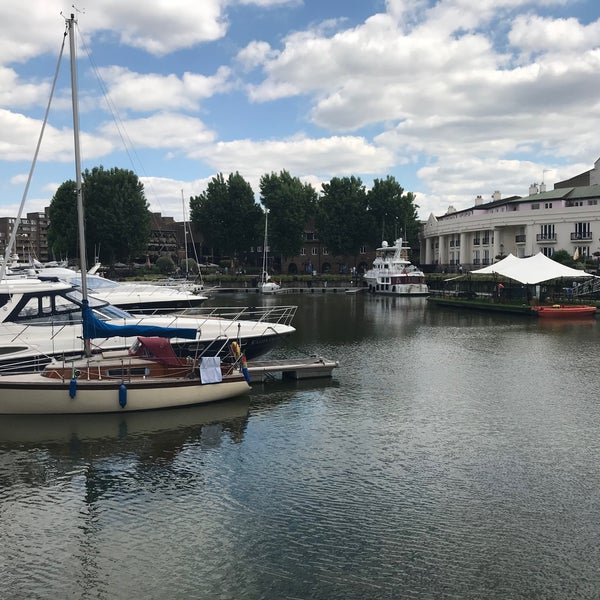 Photo taken at St Katharine Docks by Marcos C. on 6/13/2022