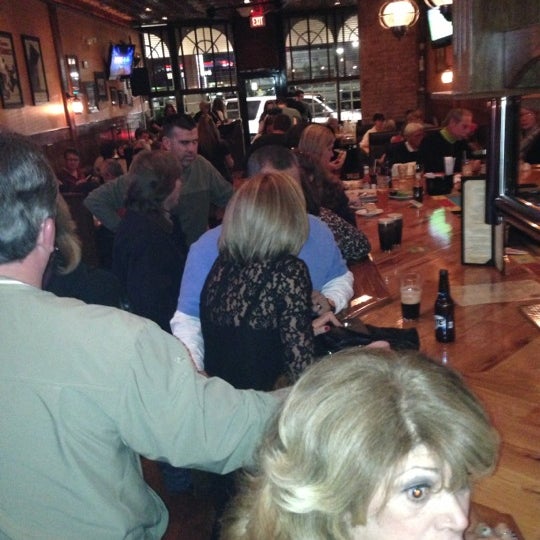 Photo taken at The Irish Penny Pub &amp; Grill by Duke M. on 12/30/2012