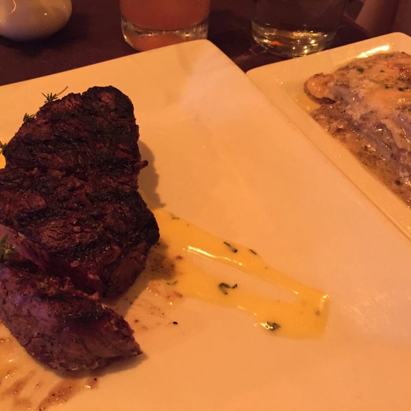 Photo taken at Timber Steakhouse &amp; Rotisserie by Zach S. on 7/4/2015