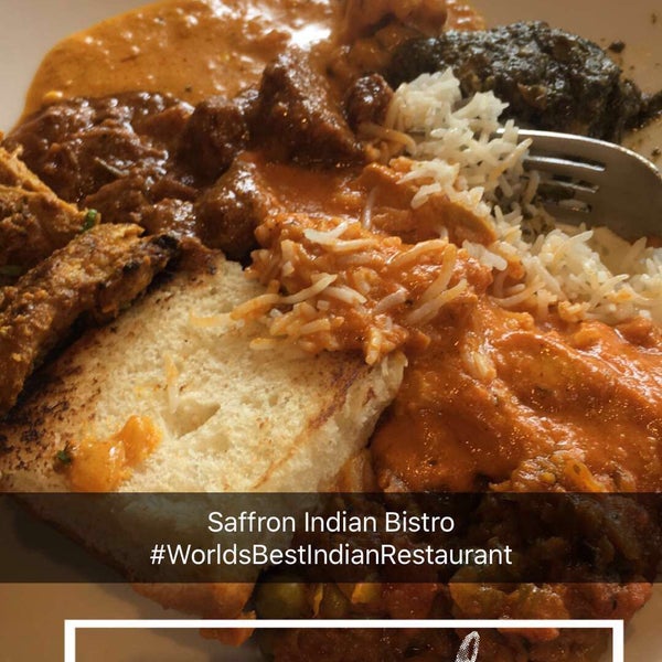 Photo taken at Saffron Indian Bistro by Winston W. on 8/18/2016