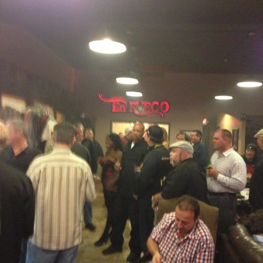 Photo taken at En Fuego Cigars &amp; Lounge by Stephen P L. on 11/9/2012