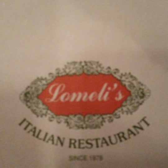 Photo taken at Lomeli&#39;s Italian Restaurant by James H. on 8/21/2014