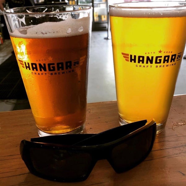 Photo taken at Hangar 24 Craft Brewery by OuH8me2 D. on 6/16/2019
