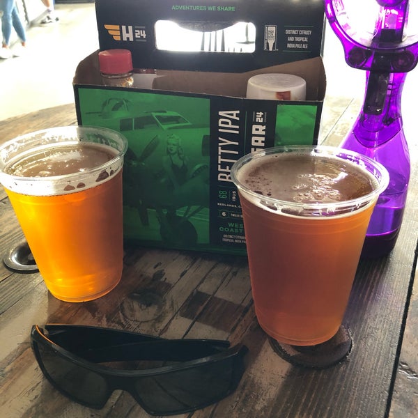 Photo taken at Hangar 24 Craft Brewery by OuH8me2 D. on 7/3/2019