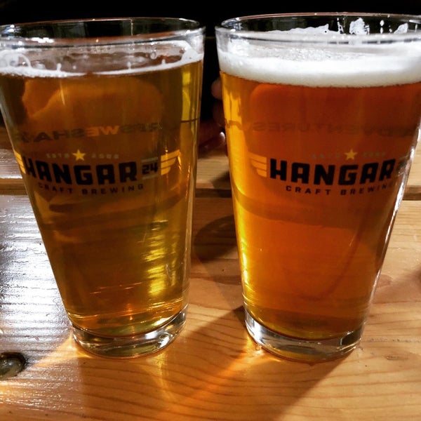 Photo taken at Hangar 24 Craft Brewery by OuH8me2 D. on 1/31/2020