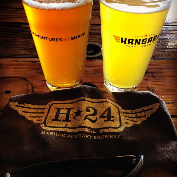 Photo taken at Hangar 24 Craft Brewery by OuH8me2 D. on 6/13/2020