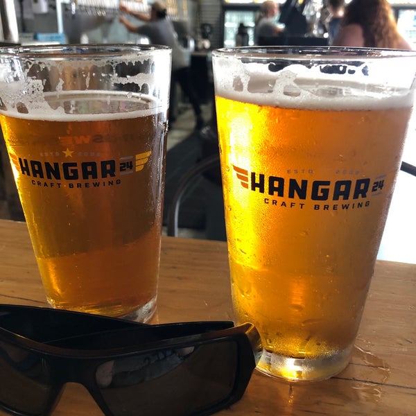 Photo taken at Hangar 24 Craft Brewery by OuH8me2 D. on 6/19/2019