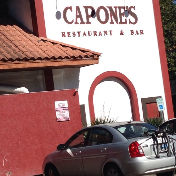 Photo taken at Capone&#39;s Bar &amp; Oven by Adam H. on 1/22/2014