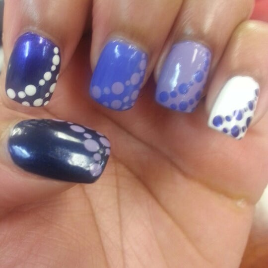 Photo taken at Lashe&#39; Nails Spa by Montrel T. on 1/27/2013