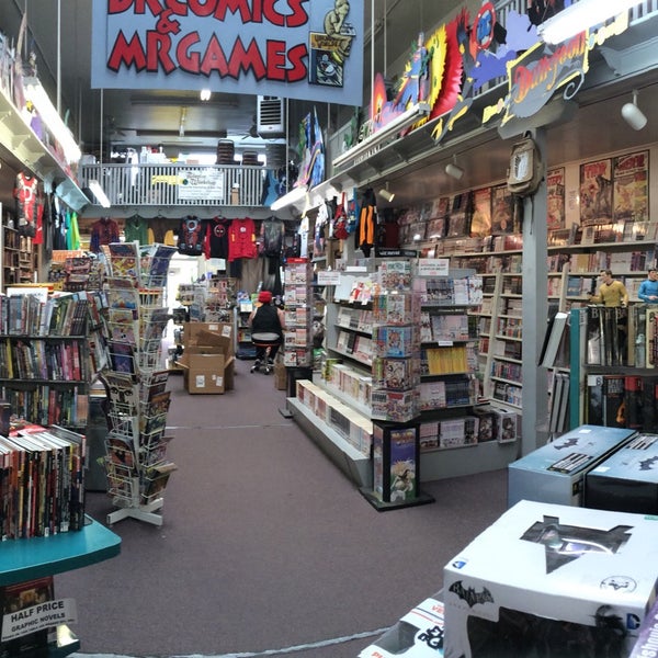 Photo taken at Dr. Comics &amp; Mr. Games by Sam C. on 5/18/2015