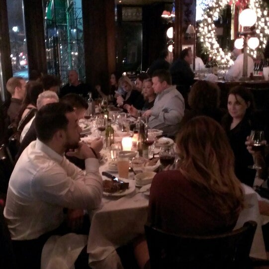 Photo taken at Dino &amp; Harrys Steakhouse by Tom B. on 12/9/2013
