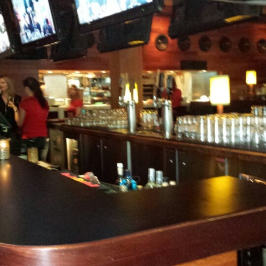 Photo taken at Hub Restaurant &amp; Lounge by Mark L. on 5/3/2014