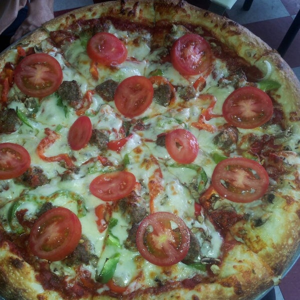 Photo taken at Free Wheeler Pizza by RetailGoddesses on 8/9/2013