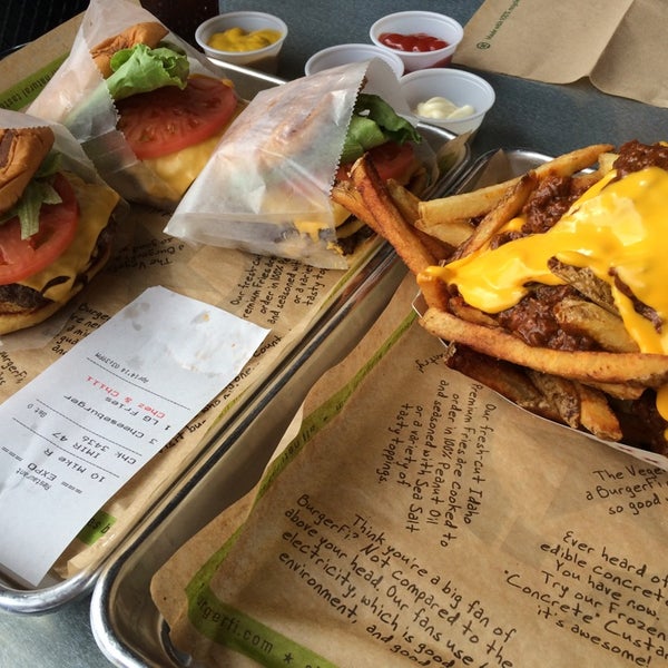 Photo taken at BurgerFi by Amer S. on 4/14/2014