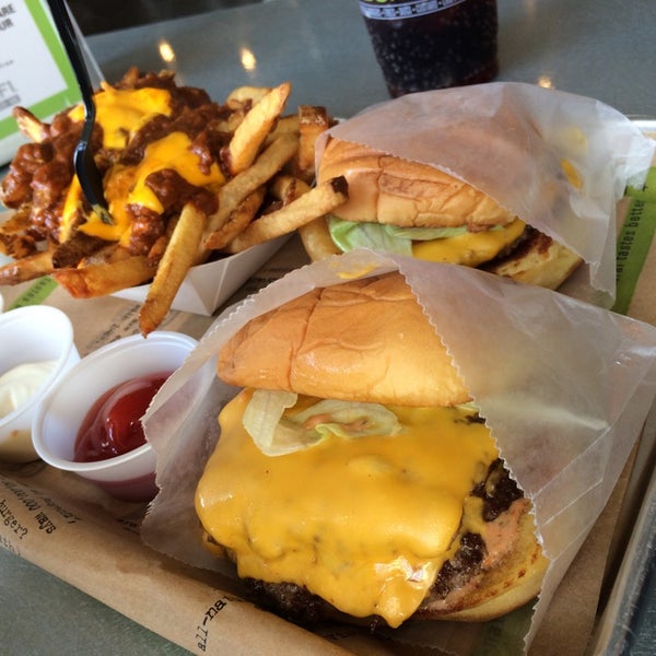 Photo taken at BurgerFi by Amer S. on 4/9/2014