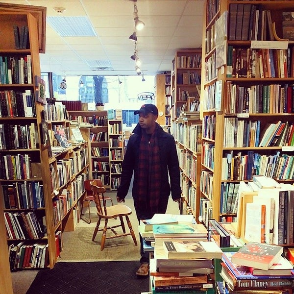 Photo taken at Rodney&#39;s Bookstore by Eugene A. on 12/23/2013