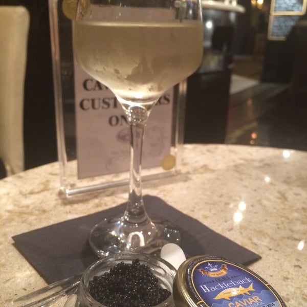 Photo taken at OLMA Caviar Boutique &amp; Bar at The Plaza Food Hall by Kyosuke W. on 7/27/2015