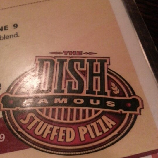 Photo taken at Dish Famous Stuffed Pizza by Josh P. on 11/3/2012