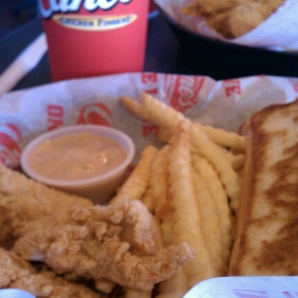 Photo taken at Raising Cane&#39;s Chicken Fingers by Mike V. on 2/5/2013
