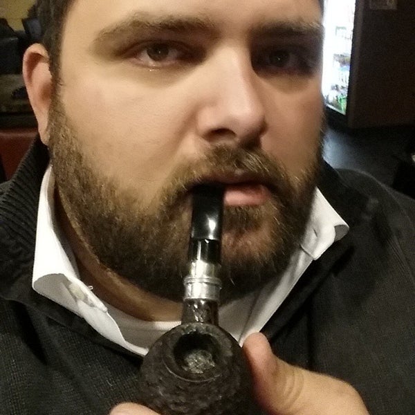 Photo taken at Crown Cigars and Ales by Foster B. on 12/2/2014