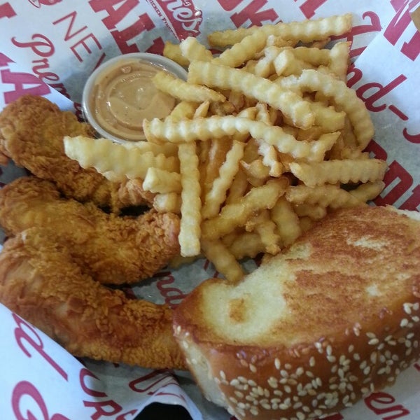 Photo taken at Raising Cane&#39;s Chicken Fingers by Julia H. on 2/20/2013